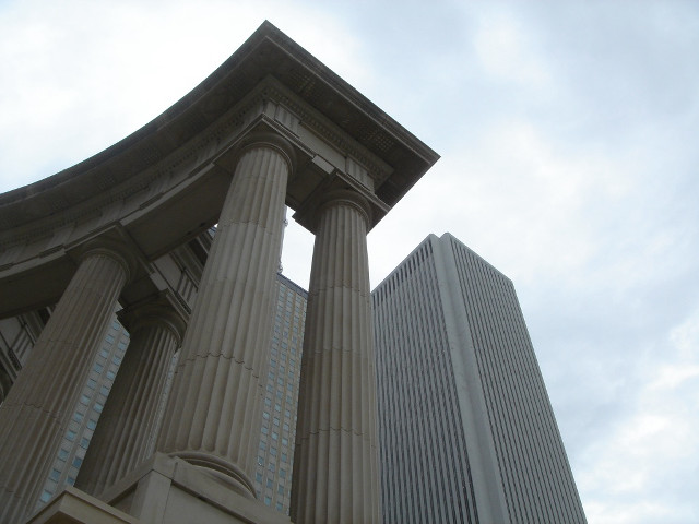 Tall building large pillars sky free wallpaper for desktop - medium preview image