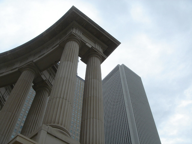 Tall building large pillars sky #2 free wallpaper for desktop - medium preview image