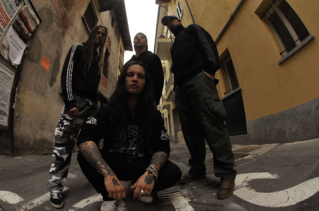 Men sitting alleyway building long free wallpaper for desktop - medium preview image