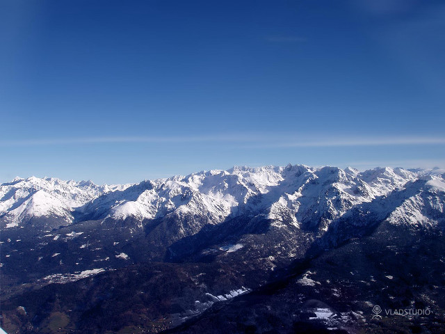 Mountain range airplane window blue #2 free wallpaper for desktop - medium preview image