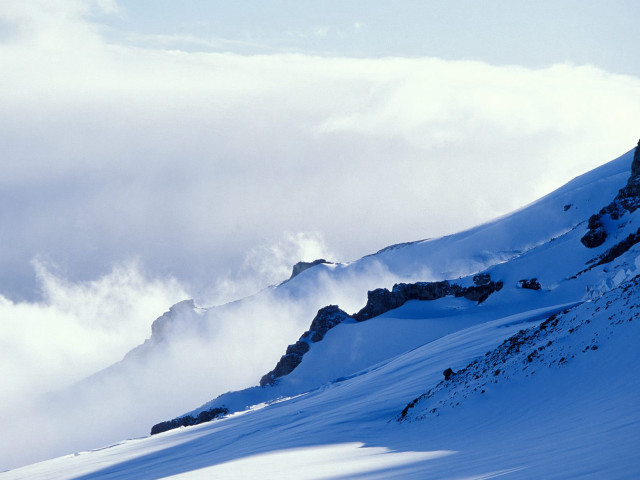 Skiing person mountain clouds background #2 free wallpaper for desktop - medium preview image