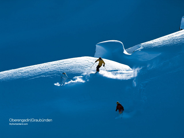 Skiing couple snow covered slope free wallpaper for desktop - medium preview image