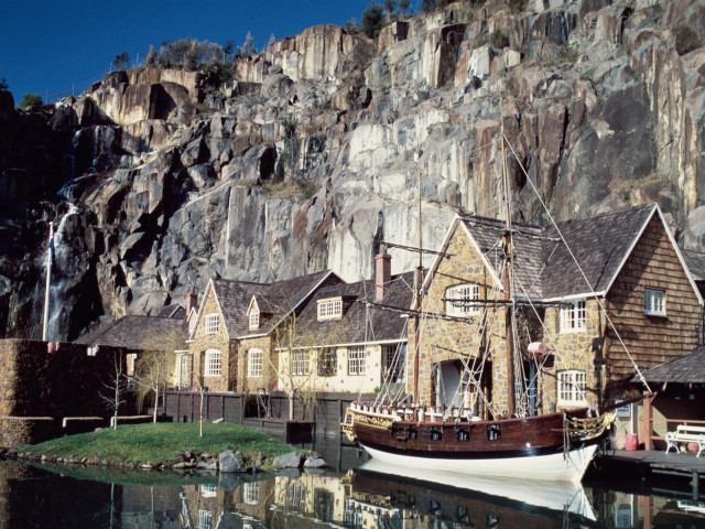 Boat docked mountain village rock free wallpaper for desktop - medium preview image