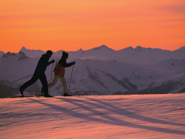 Skiing sunset slope snow covered free wallpaper for desktop - medium preview image