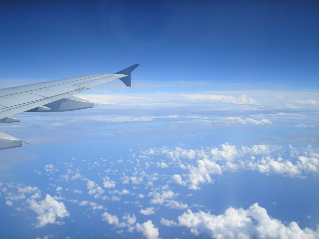 Airplane wing sky clouds water #3 free wallpaper for desktop - medium preview image