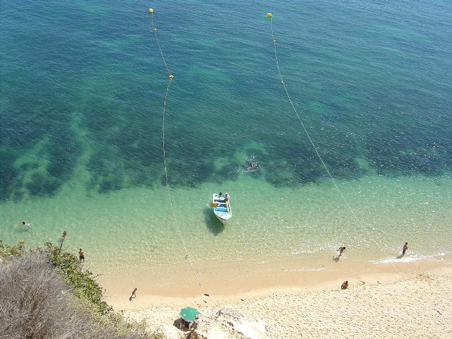 Boat tied rope beach people #2 free wallpaper for desktop - medium preview image