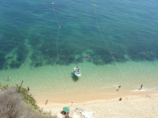 Boat tied rope beach people #3 free wallpaper for desktop - medium preview image