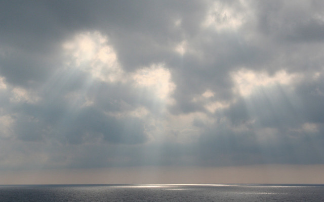 Boat ocean cloudy sky sunbeams #3 free wallpaper for desktop - medium preview image