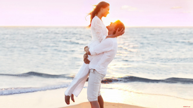 Beach sunset man woman water free wallpaper for desktop - medium preview image