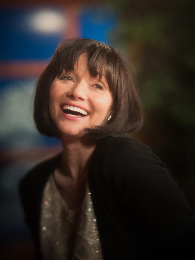 Woman smiling black jacket white free wallpaper for mobile - medium preview image