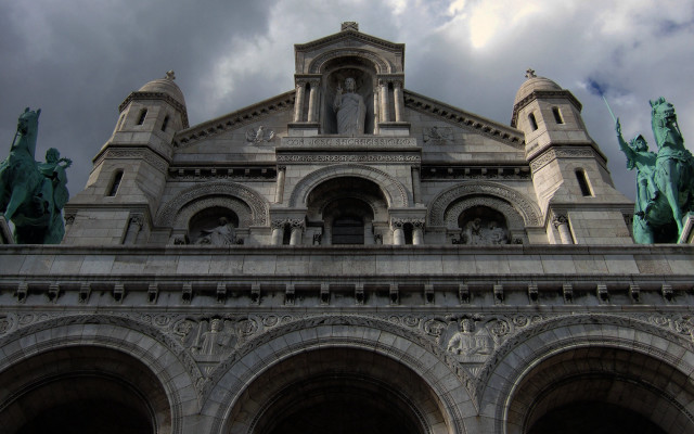 Large building statues cloudy sky free wallpaper for desktop - medium preview image