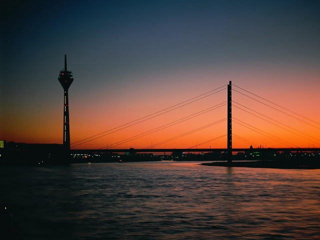 Sunset bridge tower water view free wallpaper for desktop - medium preview image