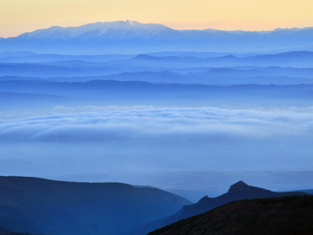 Mountain range clouds ocean shore free wallpaper for desktop - medium preview image