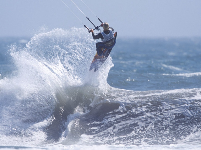 Man riding wave surfboard ocean #25 free wallpaper for desktop - medium preview image