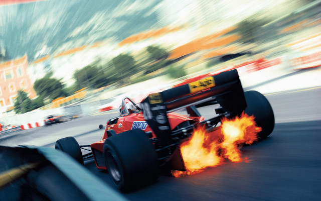 Red race car fire track free wallpaper for desktop - medium preview image