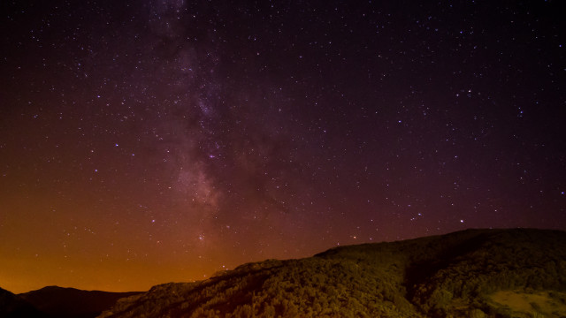 Night sky stars mountain orange free wallpaper for desktop - medium preview image