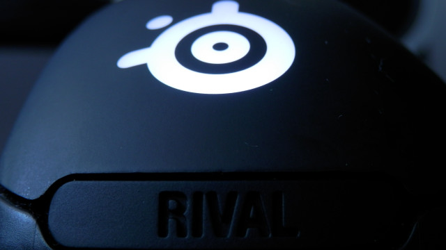 Black mouse white logo rim free wallpaper for desktop - medium preview image