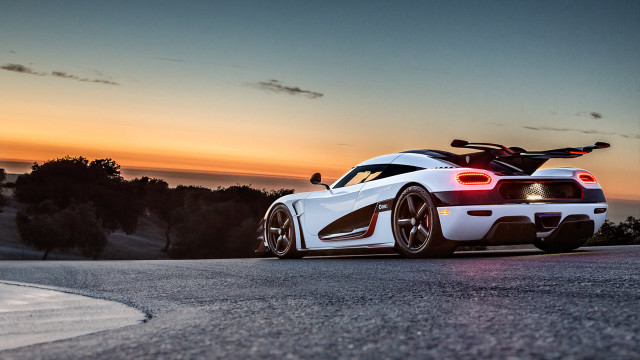 White sports car sunset road free wallpaper for desktop - medium preview image