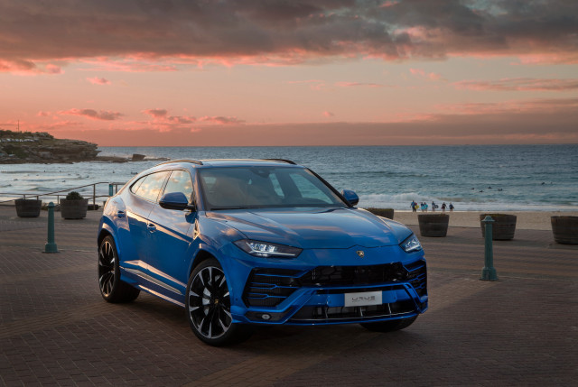 Blue car ocean sunset cloudy free wallpaper for desktop - medium preview image