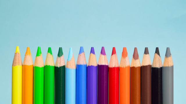 Colored pencils row blue background free wallpaper for desktop - medium preview image
