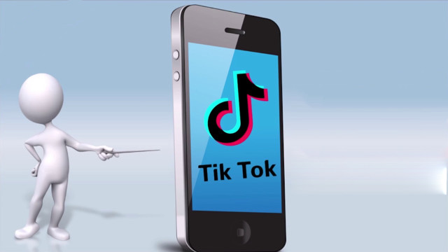 Person pointing tiktok phone screen free wallpaper for desktop - medium preview image