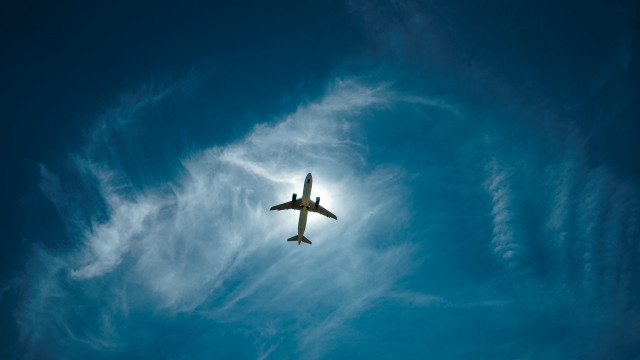 Plane flying blue sky clouds #3 free wallpaper for desktop - medium preview image