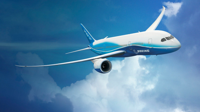 Jetliner flying blue cloudy sky #4 free wallpaper for desktop - medium preview image