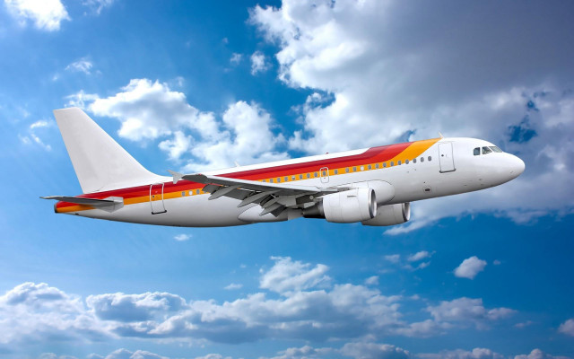 Jetliner flying cloudy sky sunny free wallpaper for desktop - medium preview image