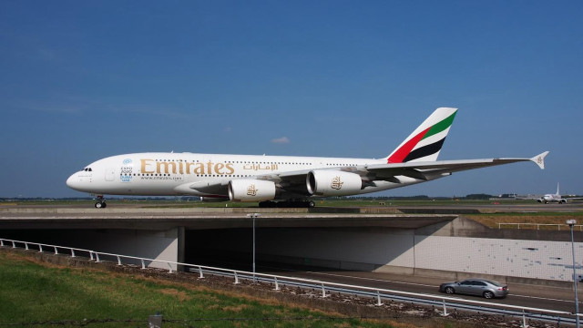 Large white airplane runway fence #2 free wallpaper for desktop - medium preview image