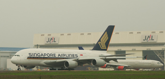 Large white airplane runway airport free wallpaper for desktop - medium preview image