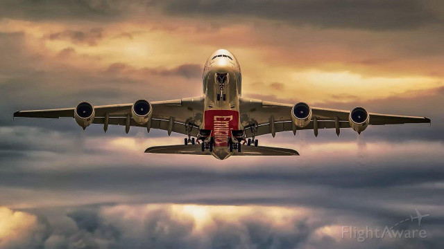 Jetliner flying cloudy sky red free wallpaper for desktop - medium preview image