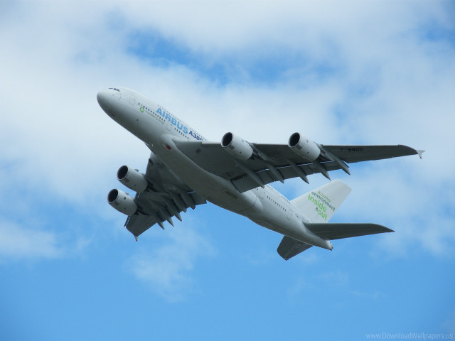 Large jet cloudy sky green free wallpaper for desktop - medium preview image