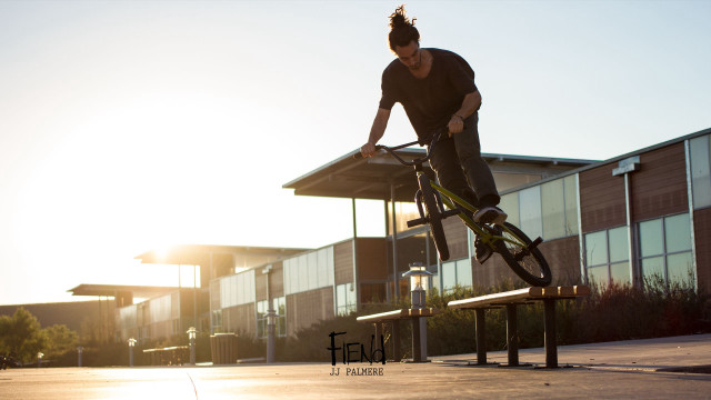 Man riding bike wooden bench free wallpaper for desktop - medium preview image