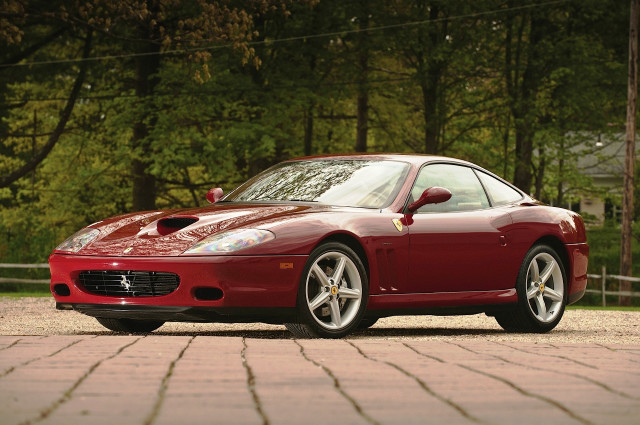 Red sports car driveway forest free wallpaper for desktop - medium preview image