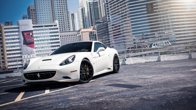 White sports car cityscape fence free wallpaper for desktop - medium preview image