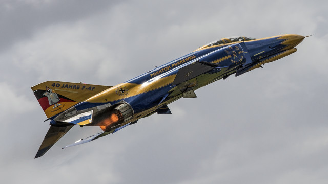 Blue yellow jet clouds military free wallpaper for desktop - medium preview image