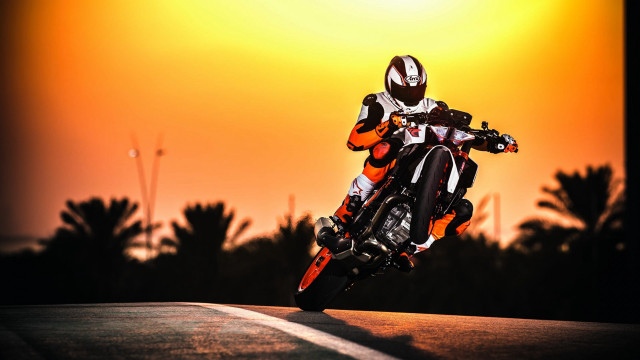 Motorcycle ride sunset orange sky free wallpaper for desktop - medium preview image
