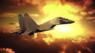 Fighter jet cloudy sky sunset - the sun behind free wallpaper