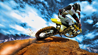 Man riding dirt bike hill 2 - a dirt bike free wallpaper