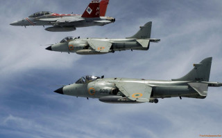 Fighter jets flying cloudy background - a cloudy background free wallpaper