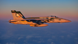 Fighter jet sunset blue sky - a few cloud below free wallpaper