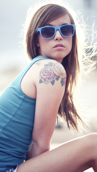 Woman flower tattoo blue shirt - a tattoo free wallpaper for mobile