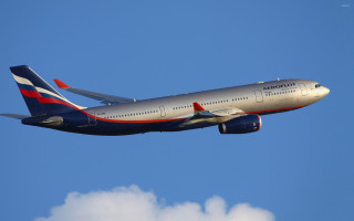 Jetliner flying blue sky clouds 13 - aleksandr gerasimov free wallpaper