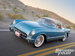 Blue car driving road hillside - a blue car free wallpaper for desktop