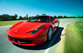 Red sports car driving road 22 - motion blur free wallpaper for desktop