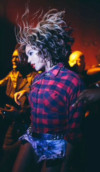 Woman futuristic fire embers plaid - a man in the background free wallpaper for mobile