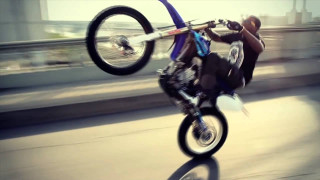 Man motorcycle trick air wheelie 2 - a trick in the air free wallpaper
