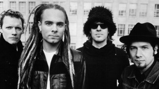 Men dreadlocks standing building tall - post grunge free wallpaper