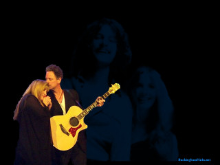 Man woman holding guitar stage - brian and wendy froud free wallpaper