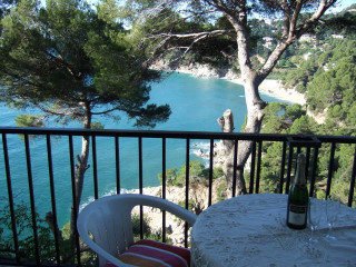 Balcony table chairs water trees - a body of water and trees free wallpaper